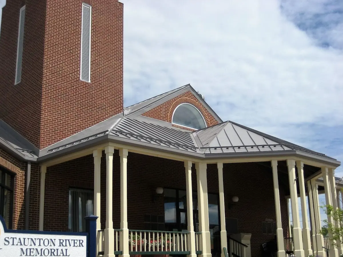 Skilled roofing craftsmen working on a residential roof in Henryetta